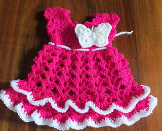 24 patterns in this Crochet Dress Roundup compiled by SimplyCollectibleCrochet.com | Butterfly Baby Dress - Andree Tunde