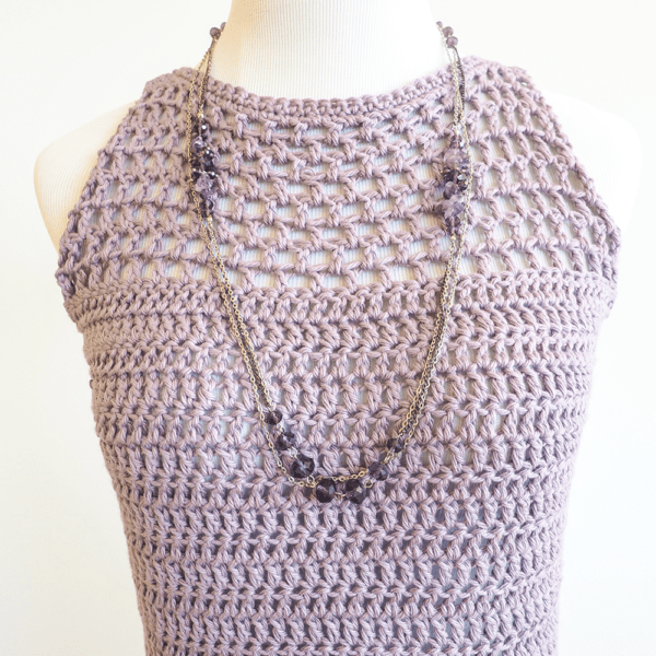This Light Crochet Tank Top is a clean, minimalist basic that can be paired with jeans, shorts, or even tucked into a skirt. #crochettop #crochettanktop #crochetpattern #crochetlove #crochetaddict