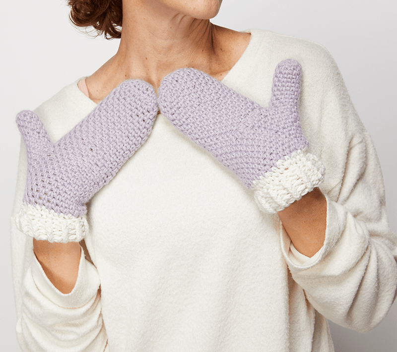 These crochet mittens are so easy to put together. The free crochet pattern is really easy to follow and you’ll end up with a snuggly pair of gloves. #CrochetMittens #CrocheGloves #CrochetAddict #FreeCrochetPattern
