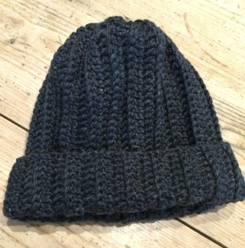 The Man Hat crochet pattern - These 14 crochet hat patterns for men are unique, fun to make and stylish. Pick up your hook and your favorite crochet beanie pattern and get stitching!  #crochethatpatterns #crochethatsformen #menscrochetbeanies