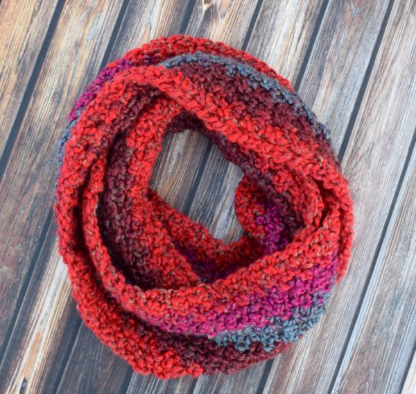 Homespun Crochet Infinity Scarf - If you’re thinking of an easy project to do this fall, look no further than these crochet infinity scarf patterns. #crochetscarf #crochetinfinityscarfpatterns #crochetpatterns