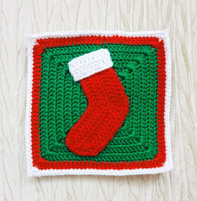 Christmas Stocking Granny Square - This holiday season have tons of fun creating these fun and festive granny squares crochet patterns for whatever project you have in mind. #grannysquarepatterns #crochetpatterns #Holidaygrannysquarepatterns