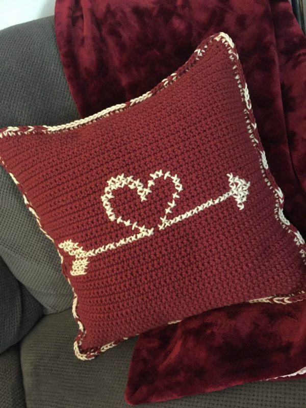 Crochet Reversible Valentine’s Heart Pillow - Start making these cuddly crochet pillows, and you’ll have all the hearts you can give when the day of love arrives! #crochetpillows #crochetpatterns #valentinecrochetpillows