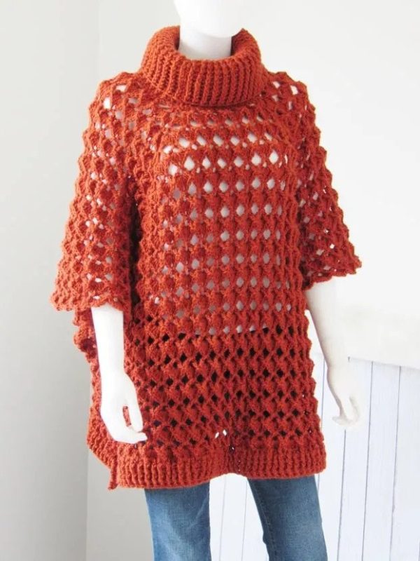 The Elise Crochet Poncho on a mannequin