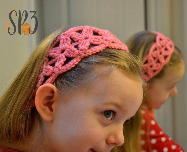 A girl wearing a Simple Flower Crochet Headband