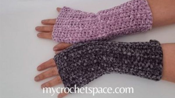 a person wearing a basic crochet fingerless gloves by my crochet space